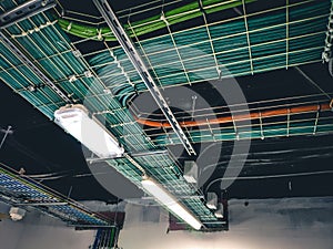 Electric trays for electrical and data cabling on site photo