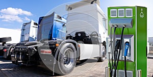 Electric truck with charging station