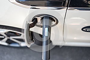 Electric vehicle when charging at a charging station