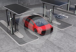 Electric vehicle charging station in public space photo