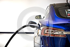Electric Vehicle charging station system storing power on modern car. EV fuel for advanced hybrid car. automobile industry.