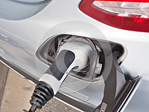 Electric Vehicle or EV car charging electric power.