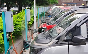 Row of electric vehicle in  electric station photo