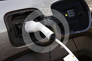 Electric vehicles are being charged by AC. photo
