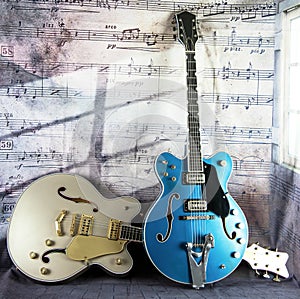 Electric Vintage Guitars against a Musical Backdrop