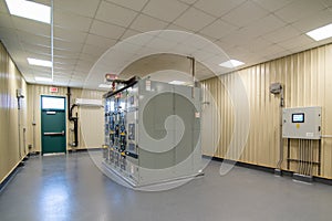 Electric voltage control room at industrial plant photo