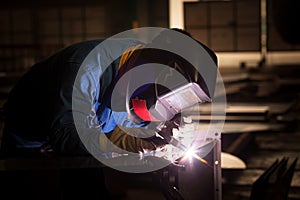 Electric welder at work