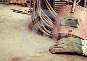 Electric welding machine, electric wire, masks, gloves and tongs, are very old