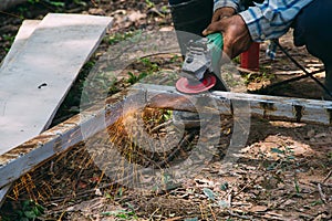 Electric wheel grinding on steel structure