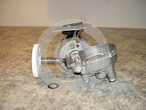 Electric wiper motor disassembled, side view