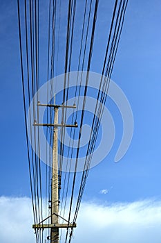 Electric wire on blue sky.