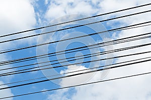 Electric wire cable on blue sky