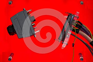 Electric wire connector for industrial machine and other on red background