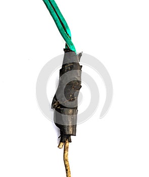 Electric wire with joint insulated with tape