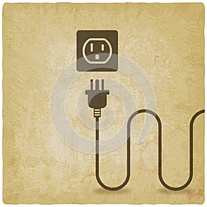 Electric wire with plug near outlet old background