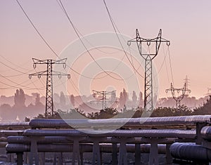 Electric wires in foggy morning