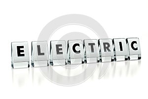ELECTRIC word written on glossy blocks isolated on white background. Electric engines becomes more popular with every year -