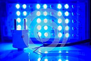 Electrical blue equipment connection. Core electric cable and lighting LED lamp