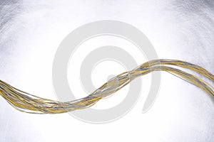 Electrical cable on grey metal background