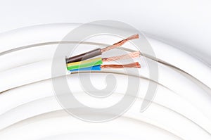 Electrical cable with three insulated conductors, horizontal