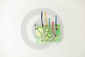 An electrical circuit board shot top-down