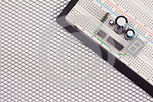 Electrical circuit on breadboard on isolated steel