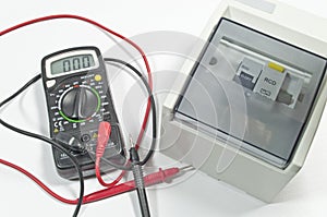 Electrical circuit Breaker & Multi-metre tester photo