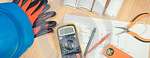 Electrical drawings, multimeter for measurement in electrical installation and accessories for engineer jobs