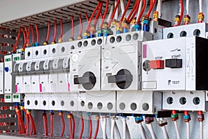 The electrical control panel are circuit breakers protecting the motor