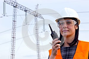 Electrical distribution engineer talking on a walkie- talkie photo