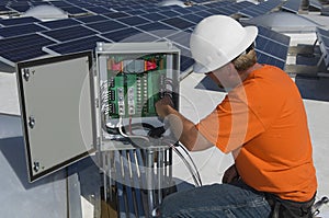 Electrical Engineer Repairing Electricity Box