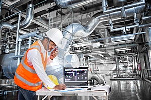 Electrical engineer working at control room of powerhouse