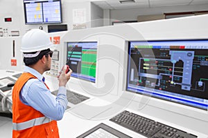 Electrical engineer working at control room of thermal power