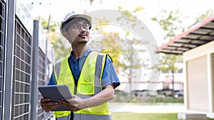 Electrical engineer working in Site. Electrical engineer man checking Power Distribution Cabinet