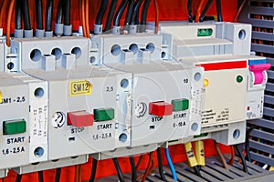Electrical equipment. Automatic circuit breakers in a row. Electric switches in fusebox