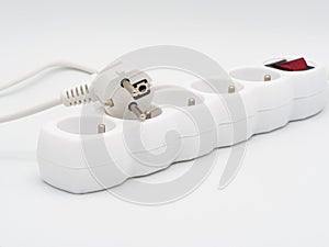 Electrical extension cord on a white background, power board