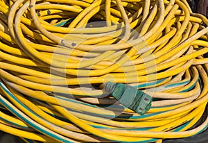 Electrical extension cord, yellow and green