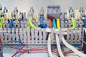 Electrical feedthrough terminals, cables and wires on the artboard.