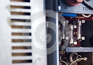 Electrical fuses on the back panel of the old tape recorder