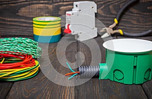 Electrical junction green box with wires used in the electric installation process