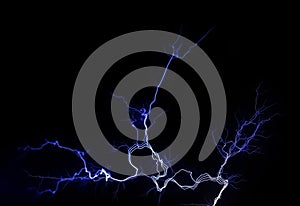 Electrical lightning bright white blue sharp electric energy detail on black background. Power generation, electricity, high