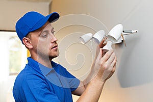 Electrical maintenance - electrician change light bulb