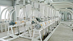 Electrical mill machinery for the production of wheat flour. Grain equipment. Grain. Agriculture. Industrial photo