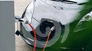Electrical nozzle is inserted into an electrocar
