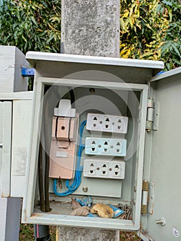 Electrical Outlet and old type cut-out. Old style circuit breaker.