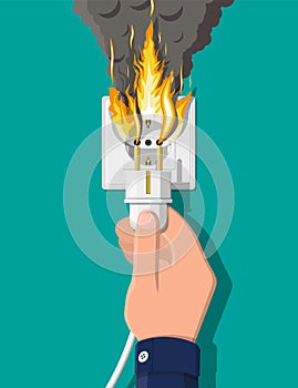 Electrical outlet on fire. Overload of network.