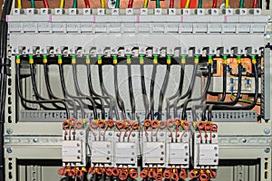 Electrical panel comprising a plurality of switches and wires photo