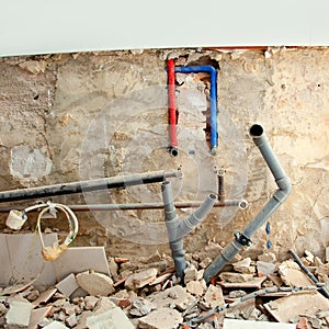 Electrical and plumbing installation in kitchen work