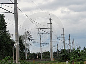 Electrical poles on railroad tracks