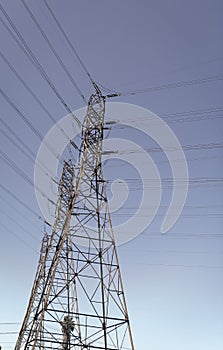 electrical power lines. pylon producing energy. voltage transmission on electric tower.